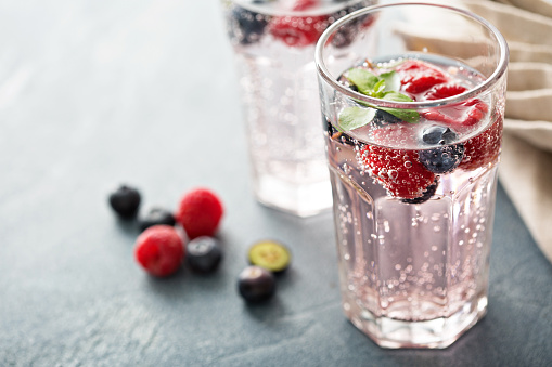 istock Sparkling water with raspberries and blueberries 534110326