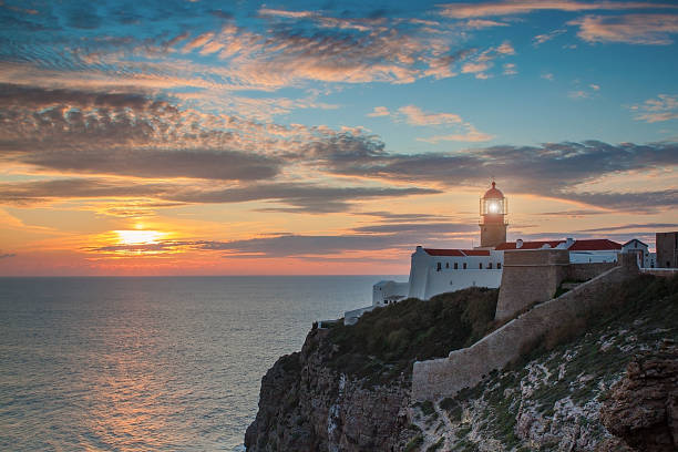 istock Of lighthouse and cliffs St. Vincent at sunset. 534110464