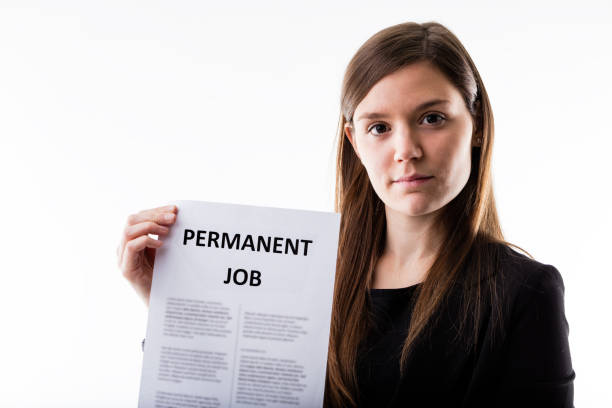 istock woman proudly holding her job contract 534112414