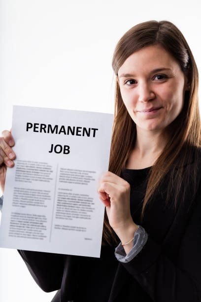 istock woman proudly holding her job contract 534112466