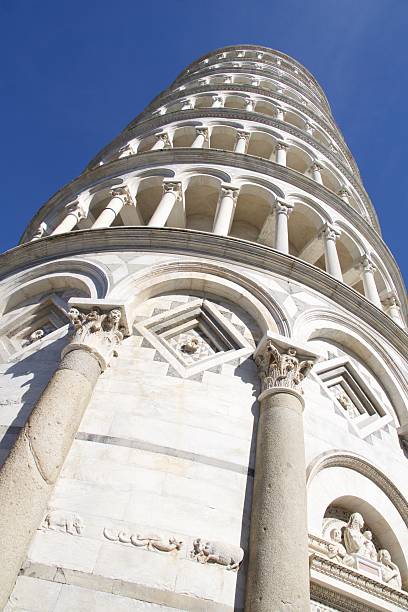 Leaning Tower of Pisa - Pisa, Italy The Leaning Tower of Pisa, located in Pisa, Italy.  One of the Seven Wonders of the World. pisa leaning tower of pisa tower famous place stock pictures, royalty-free photos & images