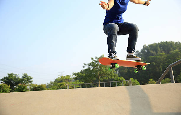istock young skateboarder  practice ollie at skatepark 534113760