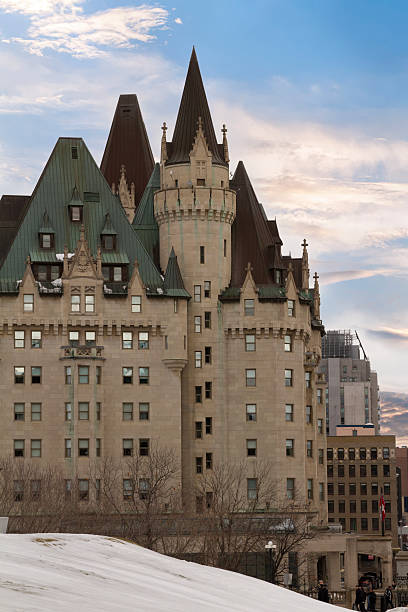 View of Fairmont Chateau Laurier from the Parliament Hill Ottawa, Canada - February 05, 2016: View of Fairmont Chateau Laurier from the Parliament Hill, Ottawa, Canada. This castle is named for Sir Wilfred Laurier, the former Prime Minister of Canada. chateau laurier stock pictures, royalty-free photos & images
