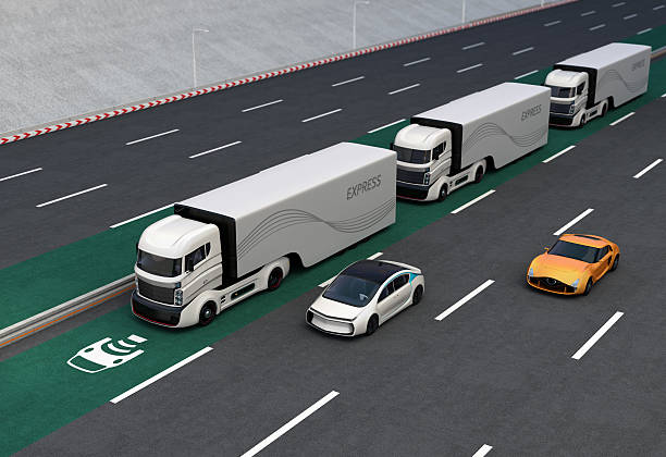 Fleet of autonomous hybrid trucks driving on wireless charging lane Fleet of autonomous hybrid trucks driving on wireless charging lane. 3D rendering image. runaway vehicle stock pictures, royalty-free photos & images