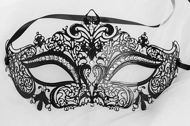 Black masquerade mask stock photo