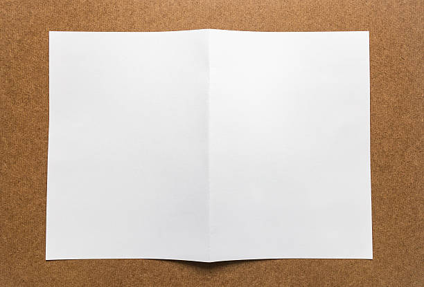 istock Brown paper note on business wood desk with copy space. 534117068