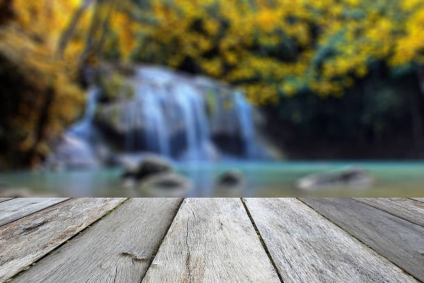 istock old vintage beige  wood texture with blurred waterfall background 534117680