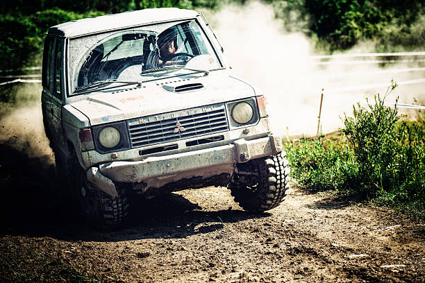 A dirty impassable country road with deep ruts