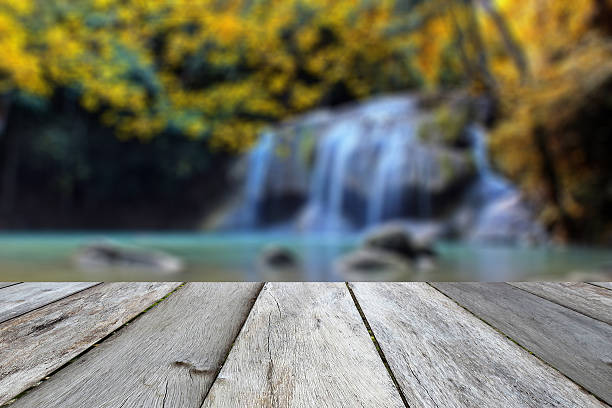 istock old vintage beige  wood texture with blurred waterfall background 534118040