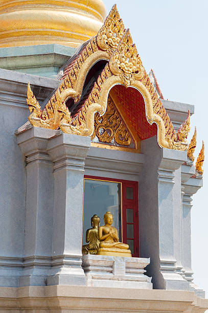 istock buddha statue in arch window of Wat Mahatat Chedi Pakdeeprak 534120572