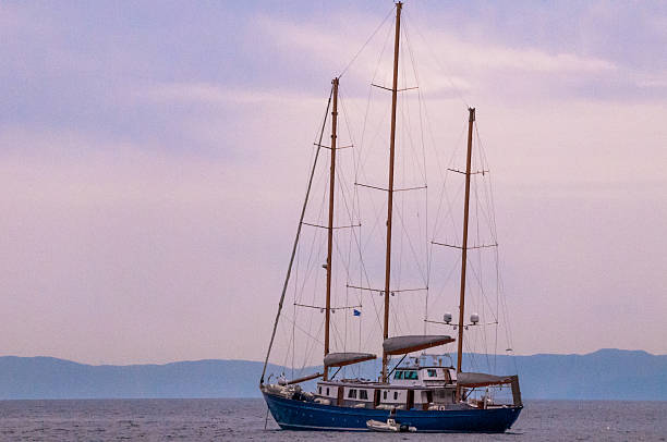 istock Ship with sails at calm sea 534123510