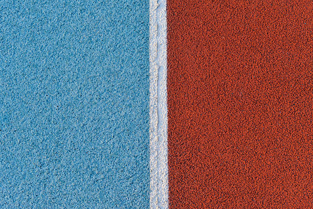 istock Blue and red running track rubber cover with white line 534126150