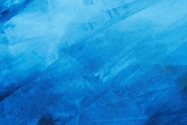 Photo of Textured blue painted background