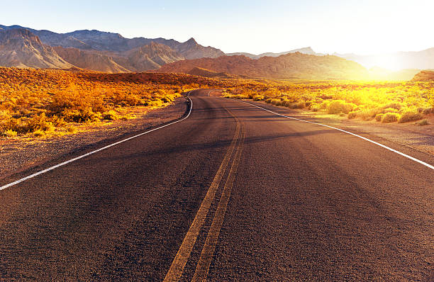 istock Red sunset over road, southern Nevada 534130036