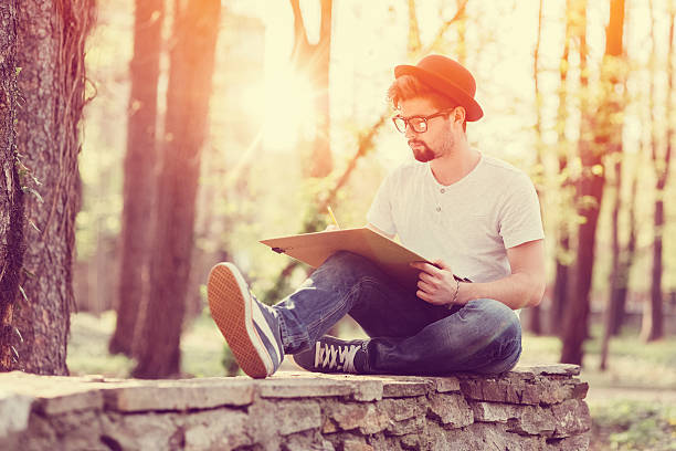 istock Young artist drawing outside 534130058