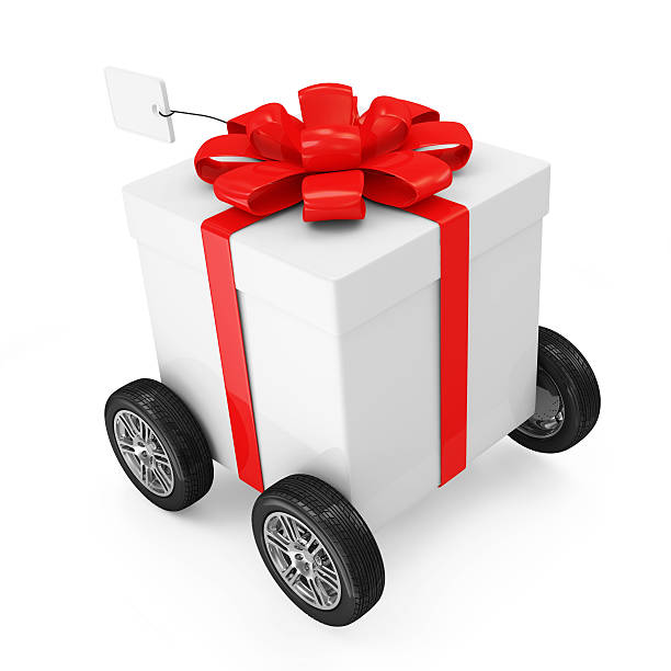 istock Gift Box with Red Ribbon on wheels 534130241