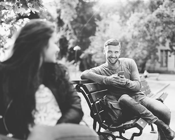 istock Flirting couple in the park 534130452