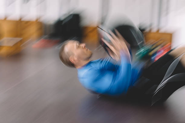 istock Sportsman exercising with medicine ball 534130632