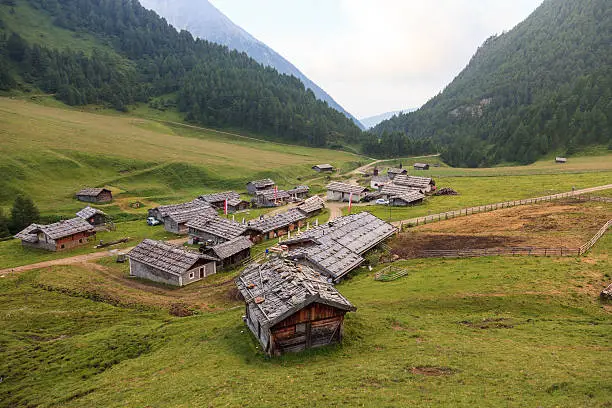 Photo of Alpine huts in the morning - Fanes Alm South Tyrol