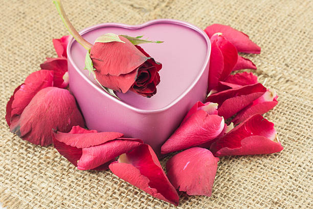 istock Heart shaped metal box on sackcloth. 534131496