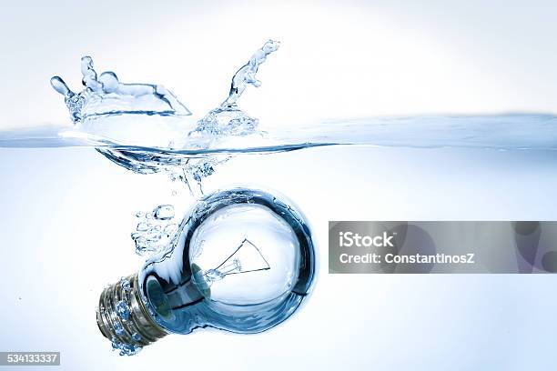 Lightbulb In Water Stock Photo - Download Image Now - Light Bulb, Water, 2015