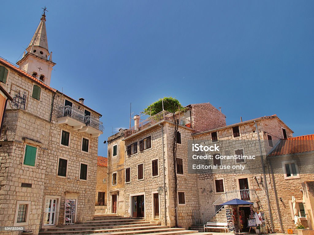 Jelsa Jelsa, Croatia - June 26, 2014: Wide angle shot of main town square early in the morning, Hvar island, Croatia. 2015 Stock Photo