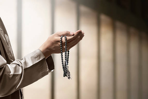 Hand of muslim people praying