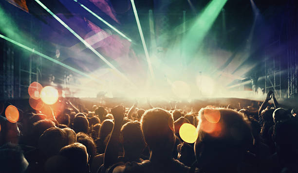 istock People at concert party. 534134242