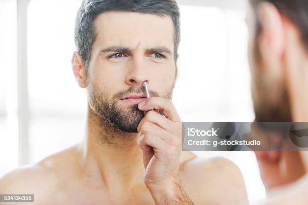 Painful Procedure Stock Photo - Download Image Now - Beard, Body Care, Men