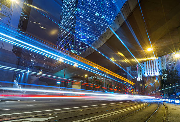 istock light trails through the footbridge,hong kong 534135852