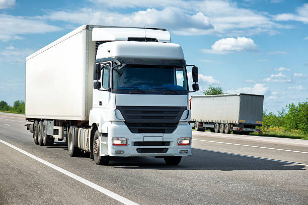 istock White truck on road. Cargo transportation 534136133