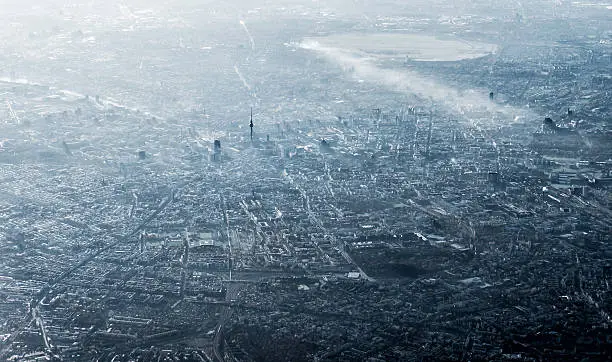 Aerial view of Berlin, Germany, monochromatic in smog and sun
