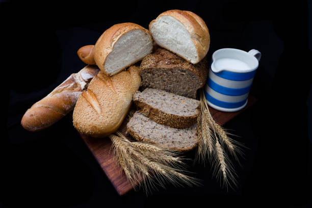 Breads and Milk Variety of breads with Milk and wheat. cerial stock pictures, royalty-free photos & images