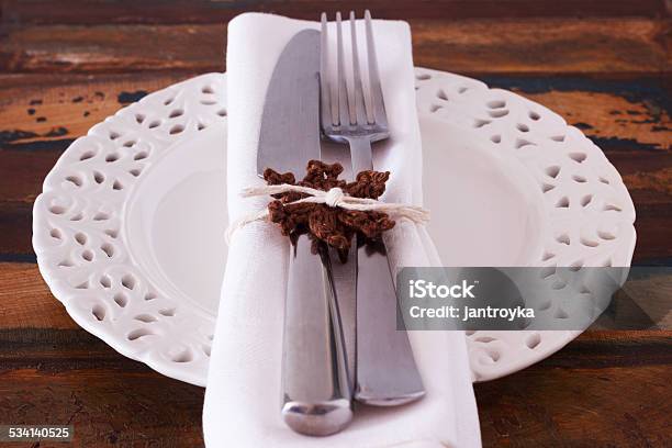 Christmas Decoration White Plate Serviette Fork Knife With Hand Stock Photo - Download Image Now