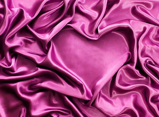 istock Heart from pink silk. Valentine's day background 534155667