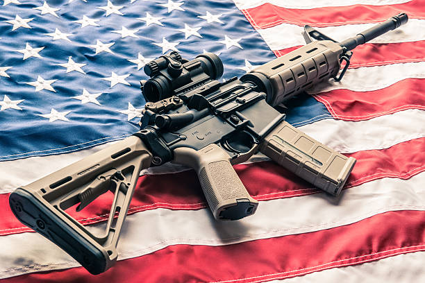 Gun Gun on American Flag carbine stock pictures, royalty-free photos & images
