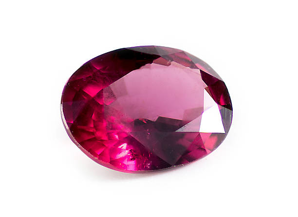 istock Macro closeup of natural red garnet isolated on white 534157089
