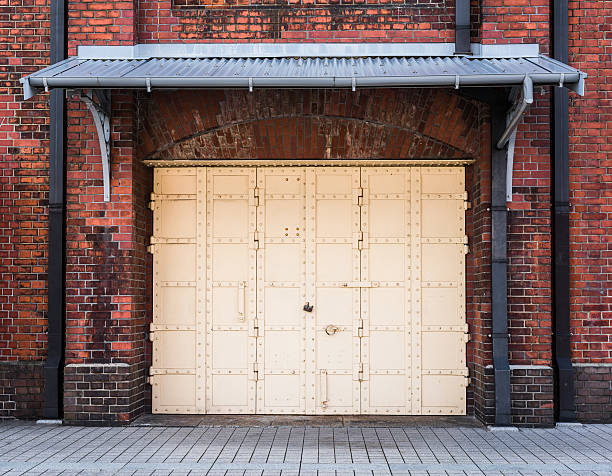 steel Door in a red brick wall background