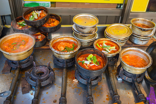 Traditional tasty Korean street food cooking on a roadside grill in downtown Seoul, South Korea's vibrant capital city. ProPhoto RGB profile for maximum color fidelity and gamut.