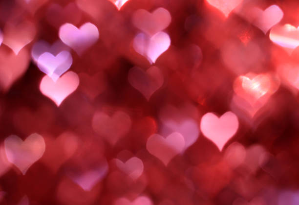 istock Abstract pink valentine background with heart-shaped boke 534163323