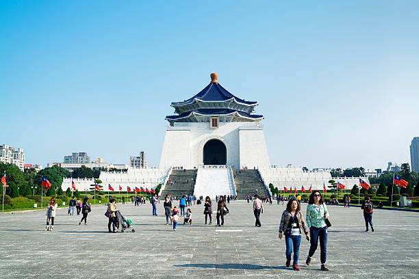 Taipei, Taiwan - Dec 29, 2014:Tourists at the Chiang Kai-Shek Memorial Hall in Taipei. Chiang Kai-shek Memorial Hall is a popular travel destination among tourists visiting Taiwan. 