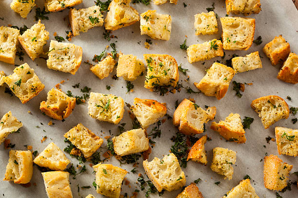 fresh homemade french croutons - kruton stok fotoğraflar ve resimler