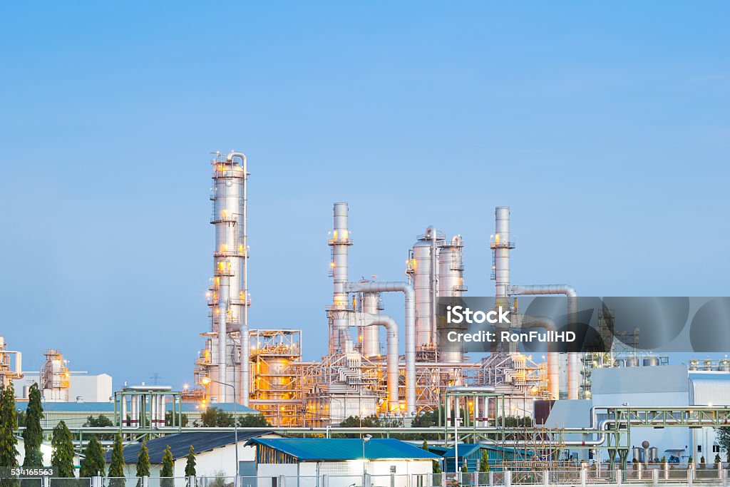 Oil refinery Oil refinery at twilight with sky background. 2015 Stock Photo