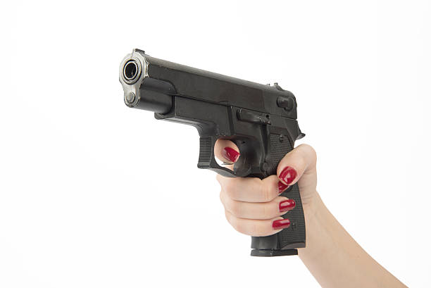 istock woman hand pointing gun 534188117