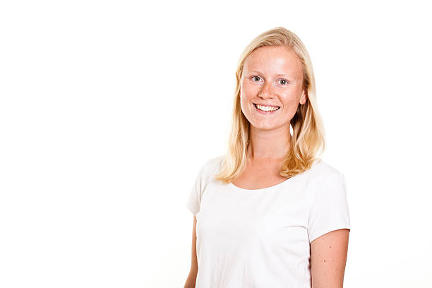 istock blond young woman with freckles 534189410