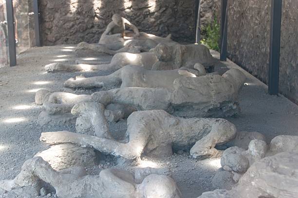 Plaster cast of the victims covered in ash, Pompeii stock photo