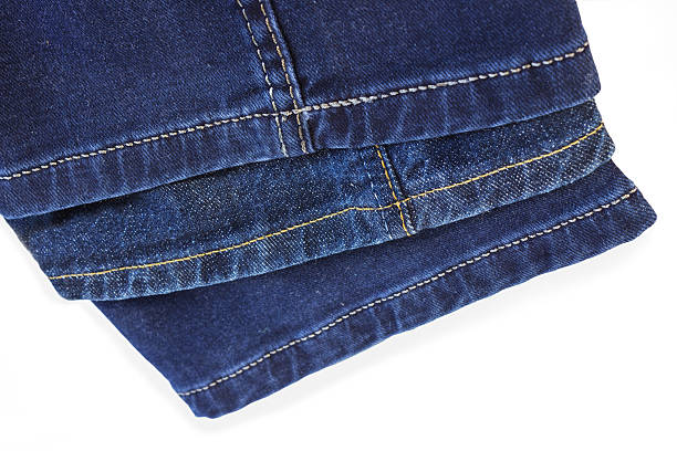 istock Bright thread seams on blue denim trousers 534193926