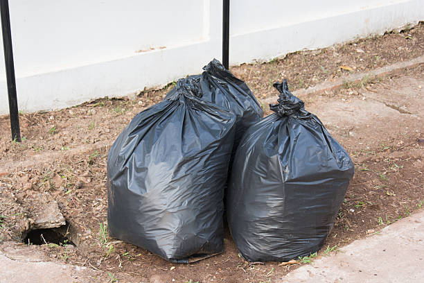 istock Plastic trash bags on outside street office 534194292