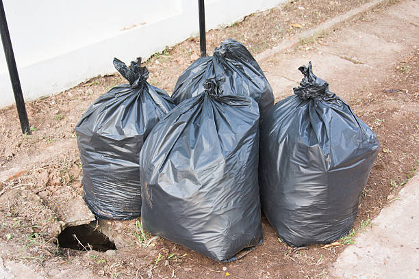 istock Plastic trash bags on outside street office 534194512