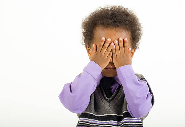 istock Young Child Plays Peek-A-Boo 534194571